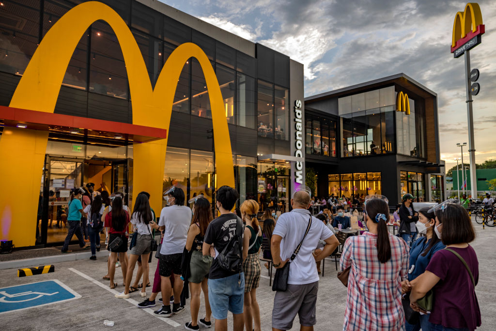 People lining up outside of a McDonald's. McDonald's New Collector's Meal Comes With Some Serious Nostalgia